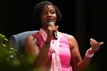 a woman holding a microphone