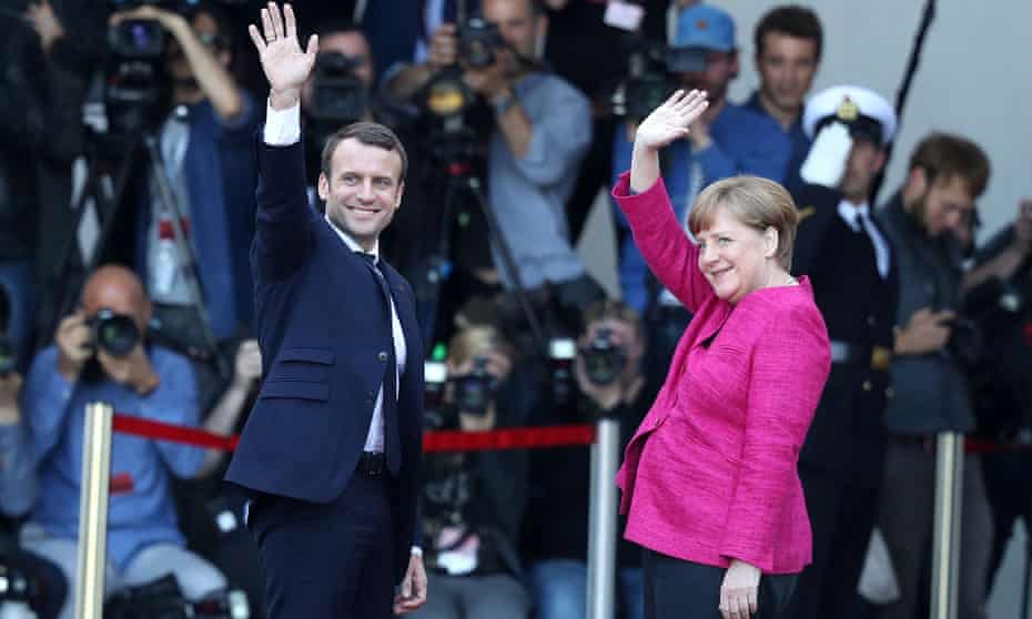 Emmanuel Macron with Angela Merkel in Berlin.