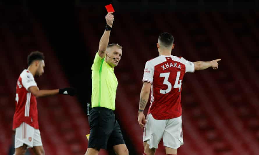Granit Xhaka is shown the red card by the referee Graham Scott during Arsenal’s 1-0 loss to Burnley.