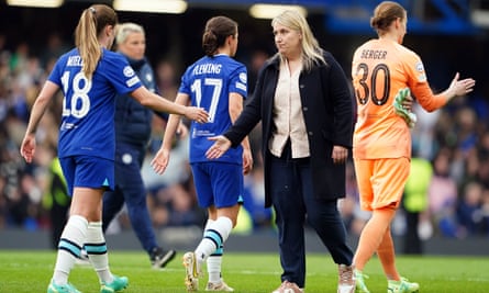 Emma Hayes consoles her Chelsea players after their Champions League defeat by Barcelona