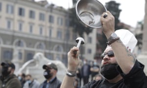 Restaurant and pub owners protest against Covid-19 restrictions in Rome on Monday.