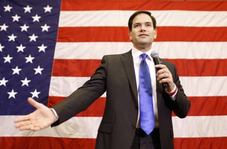 Rubio speaks standing in front of a US flag