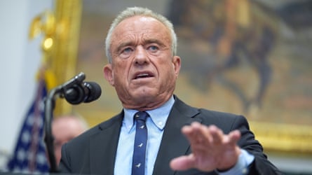 Robert F Kennedy Jr speaks into a microphone