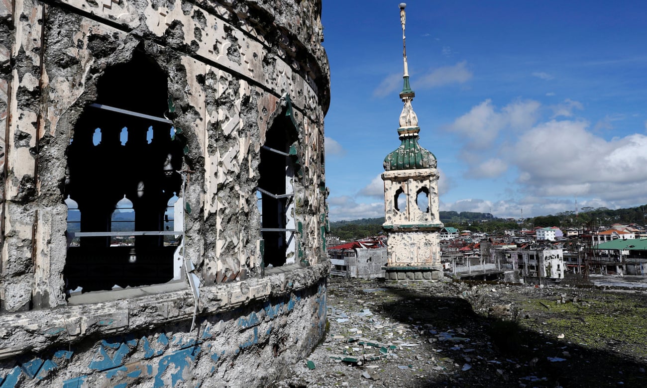 The bullet-riddled domes of Marawi’s grand mosque serve as reminders of the brutal siege of 2017 by Isis affiliate the Maute Group in the southern Philippines.