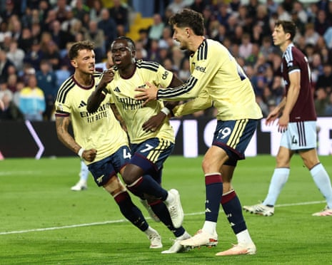 Bukayo Saka wheels away, accompanied by Ben White and Kai Havertz, after scoring the only goal of the game