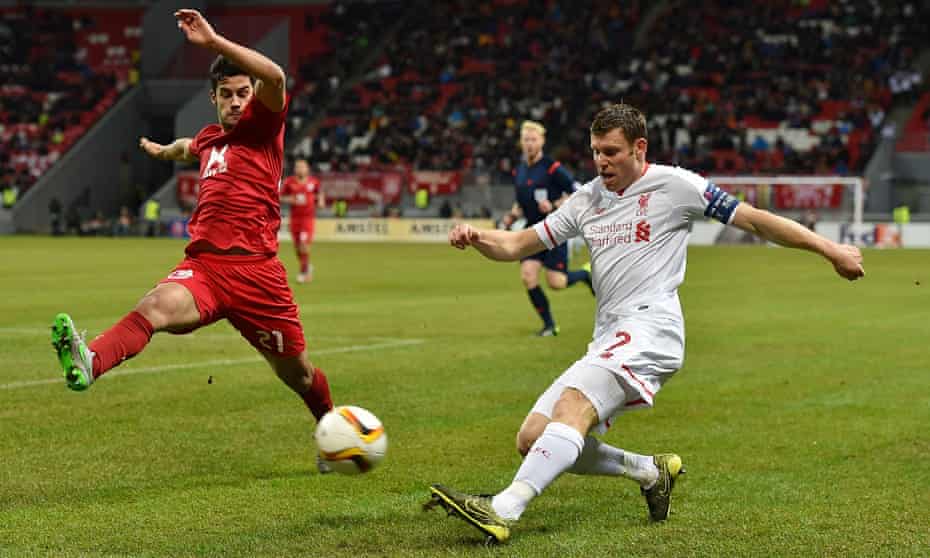 Liverpool’s James Milner crosses against Rubin Kazan