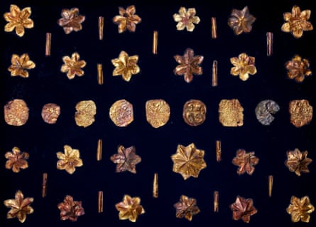 array of small jewellery-like gold objects