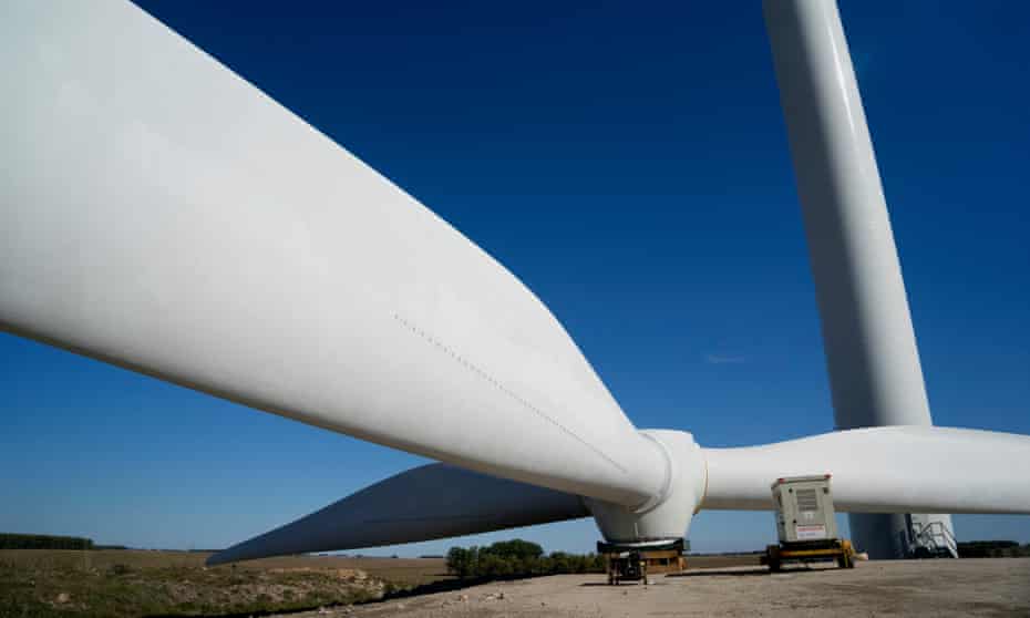 Wind turbine blades are assembled on the ground at a wind farm in Uruguay
