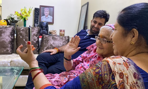 Makhu Devi, 87, on a call with his family in Pakistan.