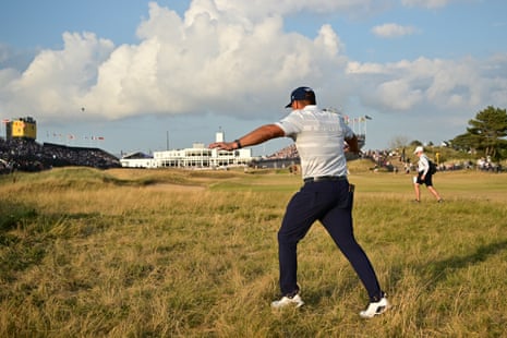 Bryson DeChambeau jokes with fans as he walks in the rough