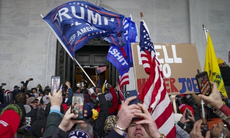 Trump supporters gather outside the Capitol in Washington on January 6, before the mobs invaded while both chambers of Congress were in session, working to certify Joe Biden’s victory in the 2020 election.