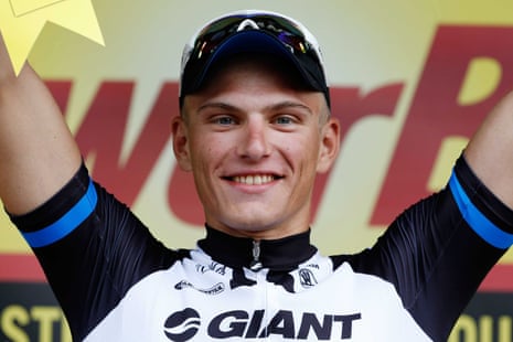 Giant Shimano team rider Marcel Kittel of Germany celebrates on the podium after winning the fourth stage of the 2014 Tour de France between Le Touquet-Paris-Plage and Lille Métropole.