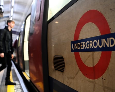A man boards a London Underground train