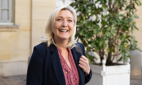 Marine Le Pen smiles after a meeting with the French prime minister, Élisabeth Borne, last week.