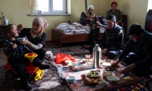 Abdilla and his family have lunch at home in Sary-Mogol.
