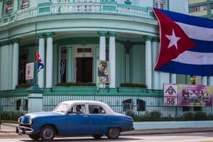 A Cuban flag and a picture of Fidel Castro decorates the headquarters of the Committees for the Defence of the Revolution