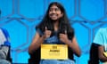 Aditi Muthukumar, 13, of Westminster, Colorado, reacts after spelling a word correctly during Thursday night’s finals of the Scripps National Spelling Bee.