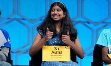 Aditi Muthukumar, 13, of Westminster, Colorado, reacts after spelling a word correctly during Thursday night’s finals of the Scripps National Spelling Bee.