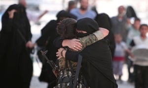 Woman embracing fighter