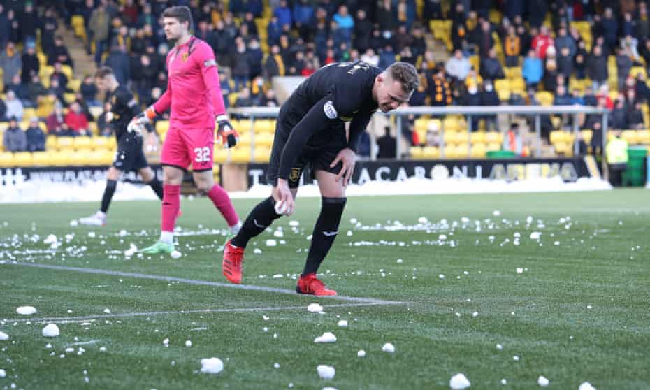 Play was suspended for 10 minutes at Livingston’s Tony Macaroni Arena after Rangers fans pelted the opposition penalty area with snowballs.