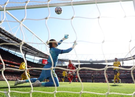 Arsenal’s Riccardo Calafiori scores their first goal past Leeds United’s James Trafford.