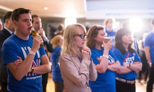 Supporters of the ‘Stronger In’ campaign watch the results of the EU referendum being announced on the morning of 24 June 2016.