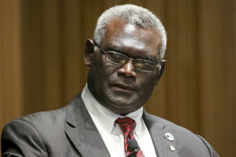 Head and shoulders of Manasseh Sogavare in a grey suit