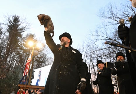 Last year, Groundhog Club handler A.J. Dereume holds Punxsutawney Phil, the weather prognosticating groundhog, during the 139th celebration of Groundhog Day on Gobbler’s Knob in Punxsutawney, Pa.
