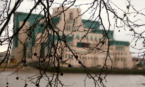 The MI6 building in Vauxhall, obscured by trees. The secrecy around the agency’s work poses a problem for recruitment.