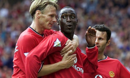 Andy Cole celebrates with Teddy Sheringham and Ryan Giggs after scoring against Newcastle at the start of the 2000-01 season
