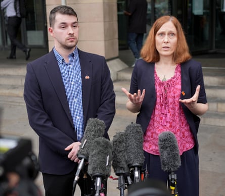 Dr Ross Nieuwoudt and Dr Melissa Ryan speak to the media outside Portcullis House, central London