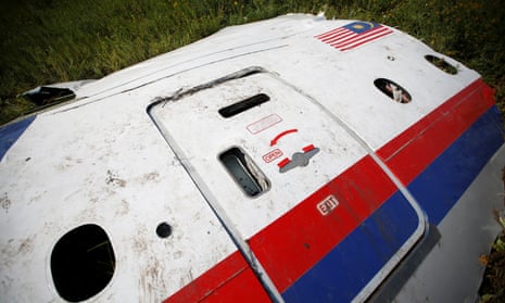 A piece of the wreckage at a crash site of Malaysia Airlines flight MH17 near the village of Petropavlivka in Donetsk region.