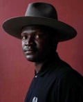 An African man in a wide fedora hat