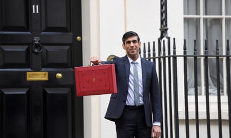 Rishi Sunak, the chancellor, posing for the tradition pre-budget photo outside No 11 with his red box.