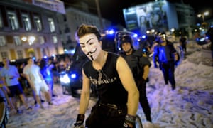 A protester demonstrating over cuts to unemployment benefit and other austerity measures in Spain.