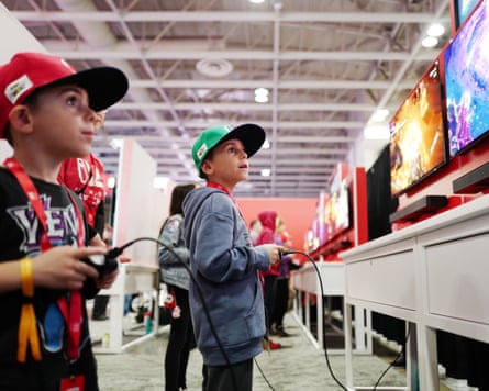 Two children play on the Nintendo Switch 2.