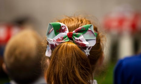 girl with Welsh flag ribbon in hair