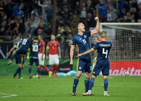 Bosnia-Herzegovina’s defender Toni Sunjic reacts with joy.