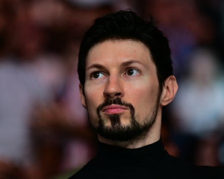 Head and shoulders of Pavel Durov who has dark hair and neatly trimmed beard and moustache