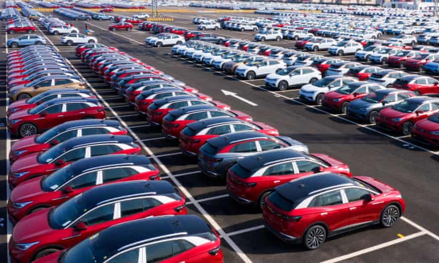rows of electric vehicles on a port in Suzhou, Jiangsu