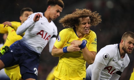 David Luiz winces during Chelsea's defeat against Tottenham at Wembley.