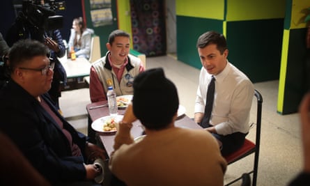 Buttigieg eats lunch with voters in Iowa, where he is now the frontrunner in the state’s Democratic primary.