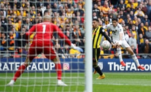 Jimenez shoots towards the goal.