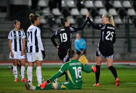 Arsenal’s Caitlin Foord celebrates scoring their fourth goal with Stina Blackstenius