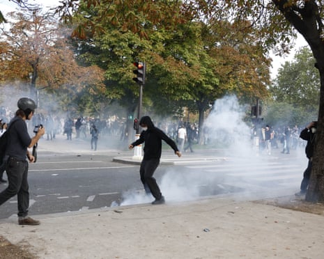 French Police forces use tear gas as High school students and members of education unions gather during a national day of protests over school condition in Paris.