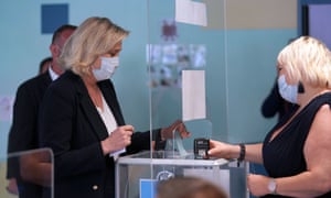 French far-right National Rally leader Marine Le Pen casts her ballot at a polling station for France Regional elections on June 20, 2021 in Henin-Beaumont, France.