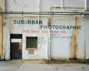 Suburban Photographic, Savannah, GA, 2002Signage provides context for the buildings, and evidence of intention. Cinematic and lush in color, the images feel like caught moments in a timeless time of Americana aesthetic.