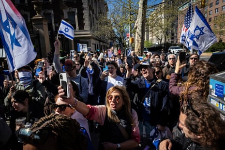 Pro-Israel demonstrators chant ‘shame’ in support of a Columbia University assistant professor, Shai Davidai, who was denied access to the main campus to prevent him from going to the lawn occupied by pro-Palestine student demonstrators.