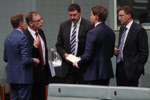 Andrew Hastie, Anthony Byrne, Mike Kelly and Julian Leeser talk to Christian Porter during voting procedures.