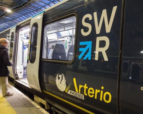 Passenger boarding an Arterio train at London Waterloo